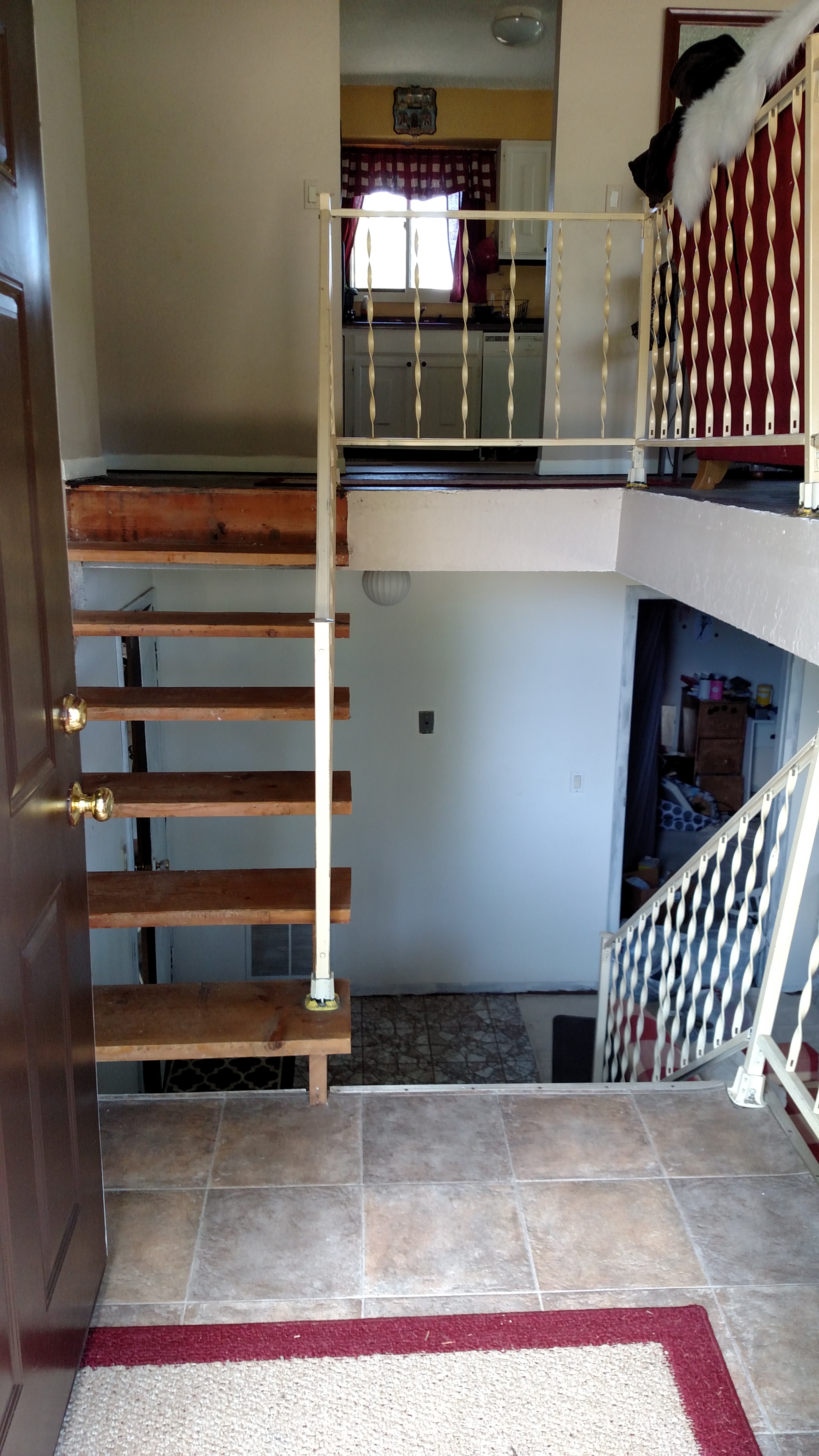 split level staircase and entryway makeover